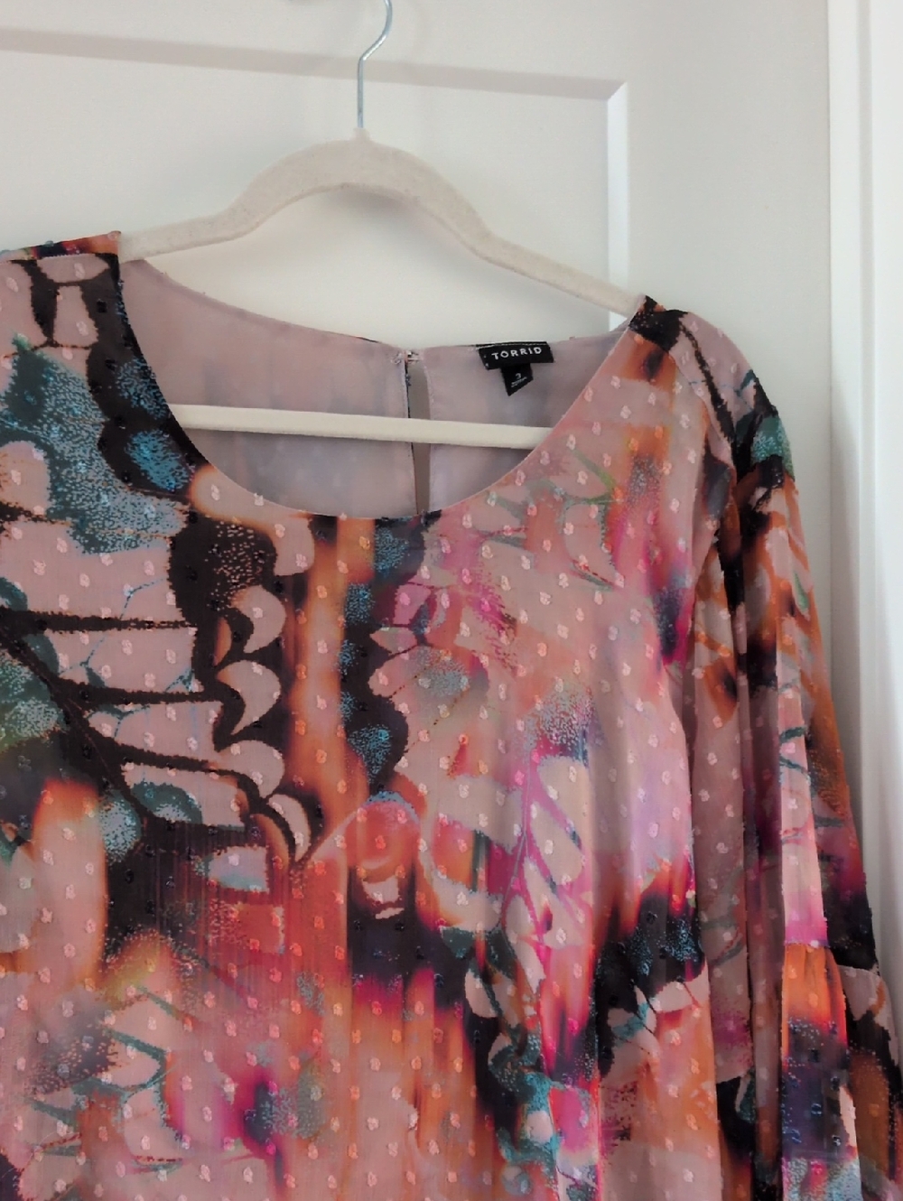 182: Torrid cliptop multicolor blouse